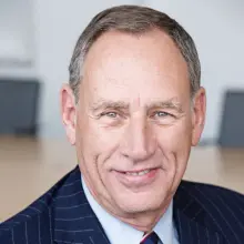 man in navy striped jacket