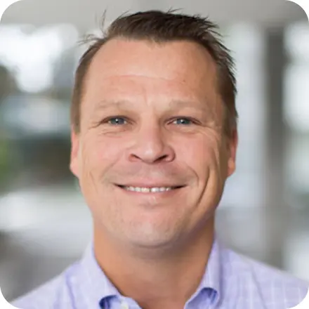 Smiling man with brown hair