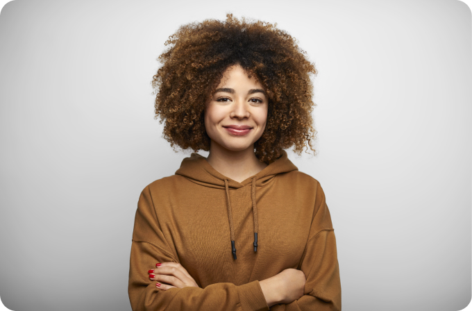 Woman in rust colored hoodie